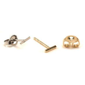 https://cdn.shopify.com/s/files/1/0609/9832/0342/files/14ky-and-14kw-030-t-bar-friction-earring-posts-and-standard-5-8mm-backs-set-otto-frei_74db7c69-0af2-44b4-9c90-74ac098056c3.jpg?v=1689358379&width=292