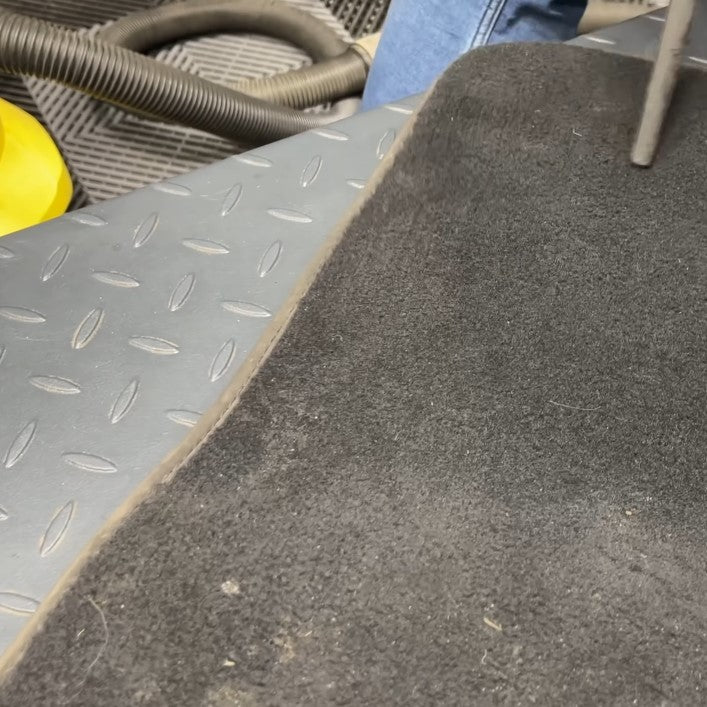 Vacuum the carpet mat