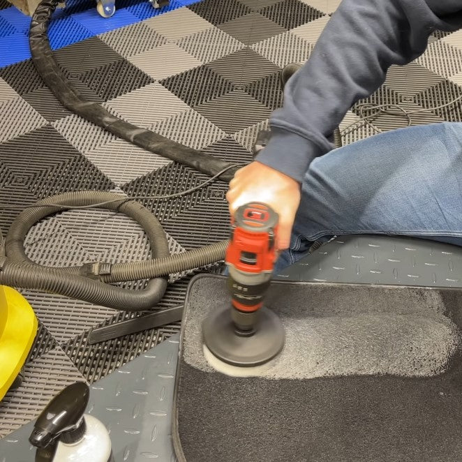 Drill Brush on floor mat