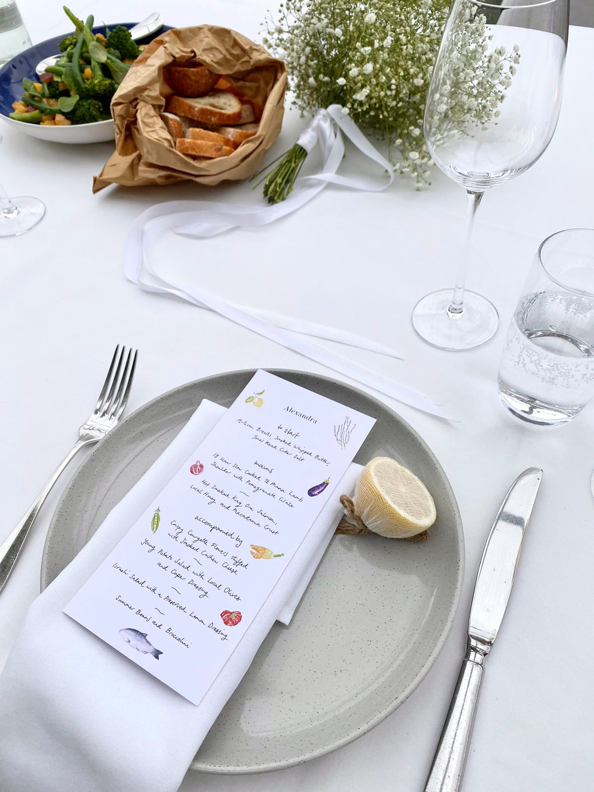 brogan scott watercolour illustrations for a wedding dinner menu on a table