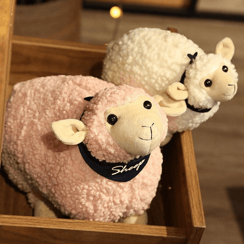 peluche doudou mouton rond blanc et rose