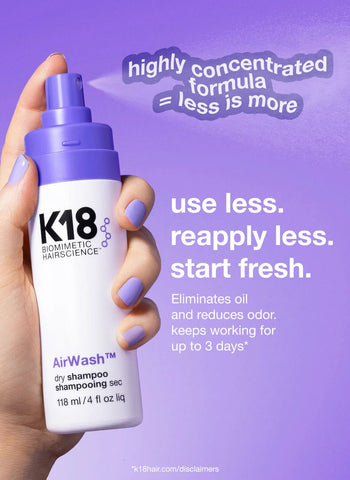 A hand holds a bottle of K18 AirWash Dry Shampoo by Simply Colour Hair Salon Studio & Online Store against a purple background. Text highlights its concentrated formula, powered by odorBIND biotechnology, suggesting to "use less, reapply less, start fresh" and that it works up to 3 days.