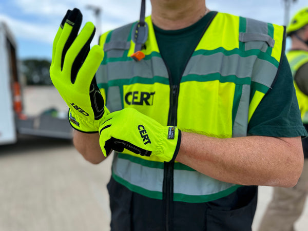 CERT volunteer donning PPE gloves