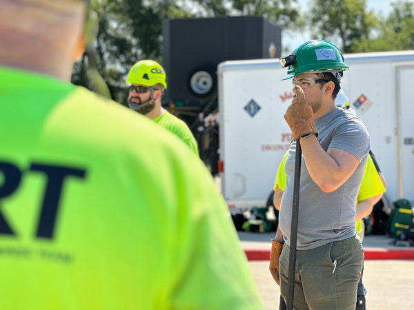 CERT volunteer holding lever for cribbing