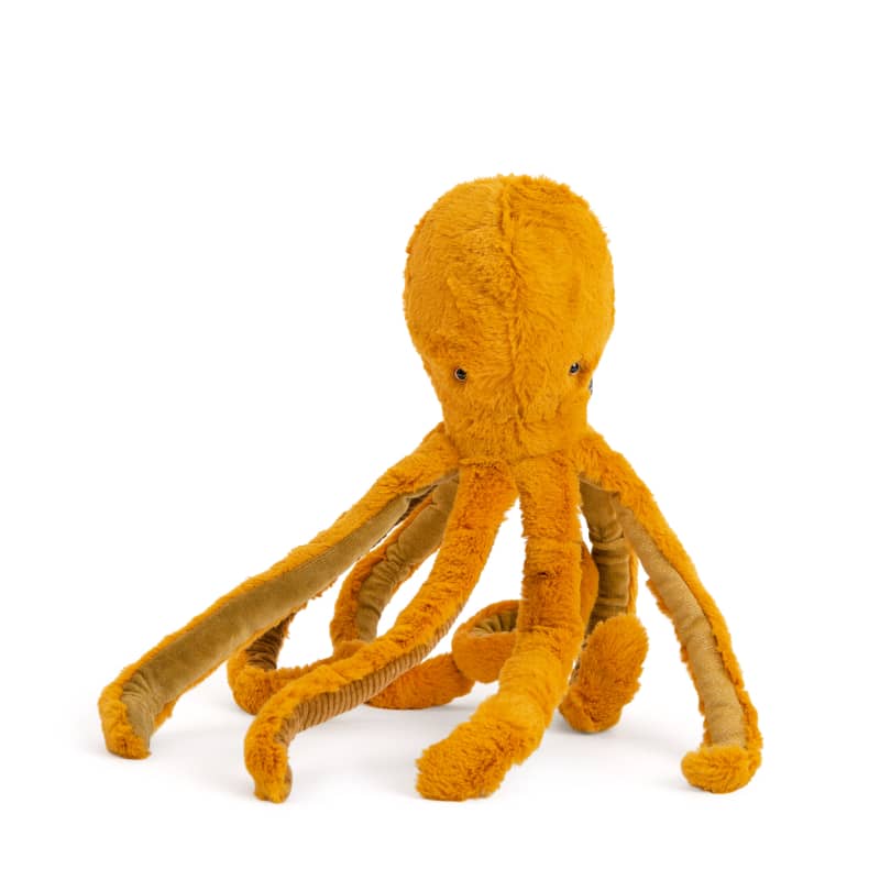 <h5>Description</h5>
<p>From All Around the World collection, Small Octopus is a plush that is covered in gold!<br>His numerous velvet tentacles sway to the rhythm of his movements.<br>He invites us into the depths of the ocean to meet different attracting and friendly species!<br>  ##### Specifications</p>
<p><strong>Color</strong>: Blue<br><strong>Recommended Age</strong>: 10m+<br><strong>Material</strong>: Cotton, polyester, metallic fibers<br><strong>Size (inches)</strong>: H: 17,72<br><strong>Weight (lbs)</strong>: 0,3<br><strong>Care instructions</strong>: Machine washable at 30°C on wool cycle. No tumble dry.</p>
