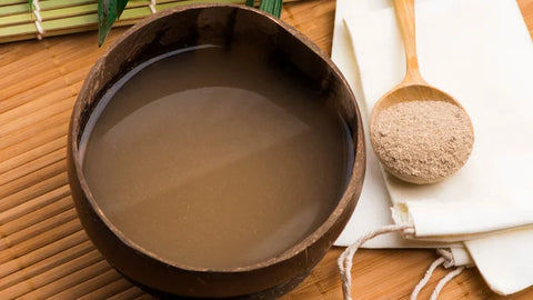 kava brew in coconut bowl