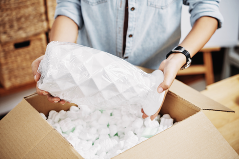 wrapped item with packing peanuts