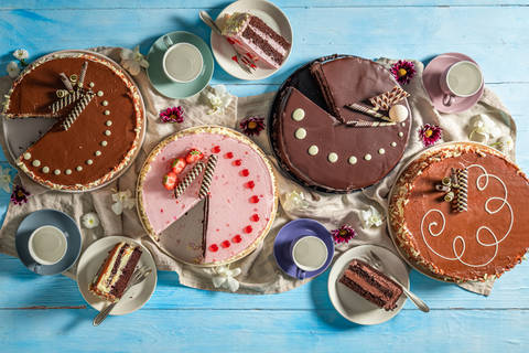 different types of cakes displayed