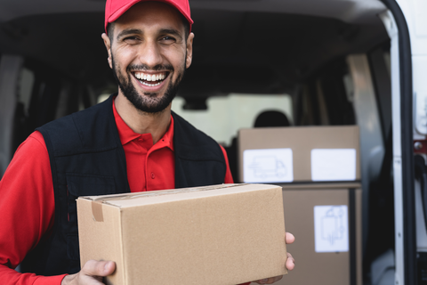 delivery man with holding box