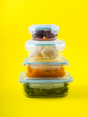 stack of food containers with food