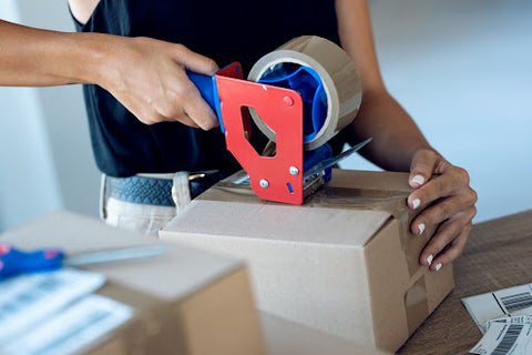 packing boxes with packaging tape