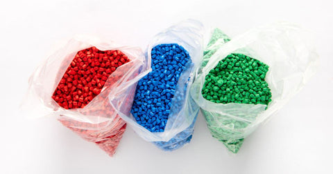 nurdles in red, blue and green colors
