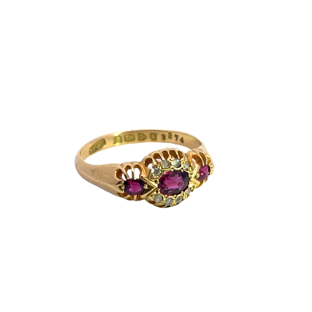 Georgian 18Ky gold, ruby and rose cut diamond halo ring