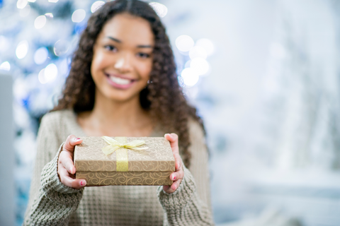 Corporate Gifting - Staff giving a gift