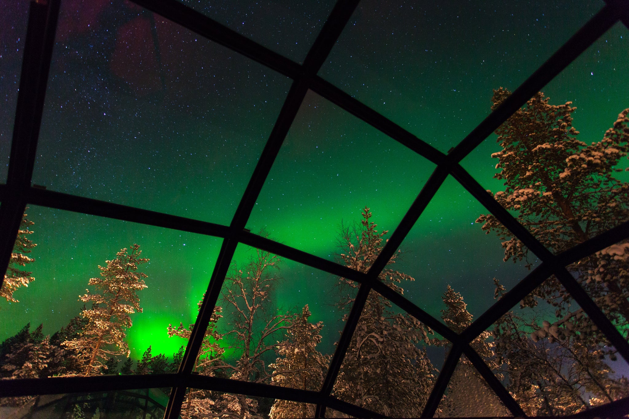 Northern Ligths from Glass Igloo at Kakslautten Artic Resort Finland