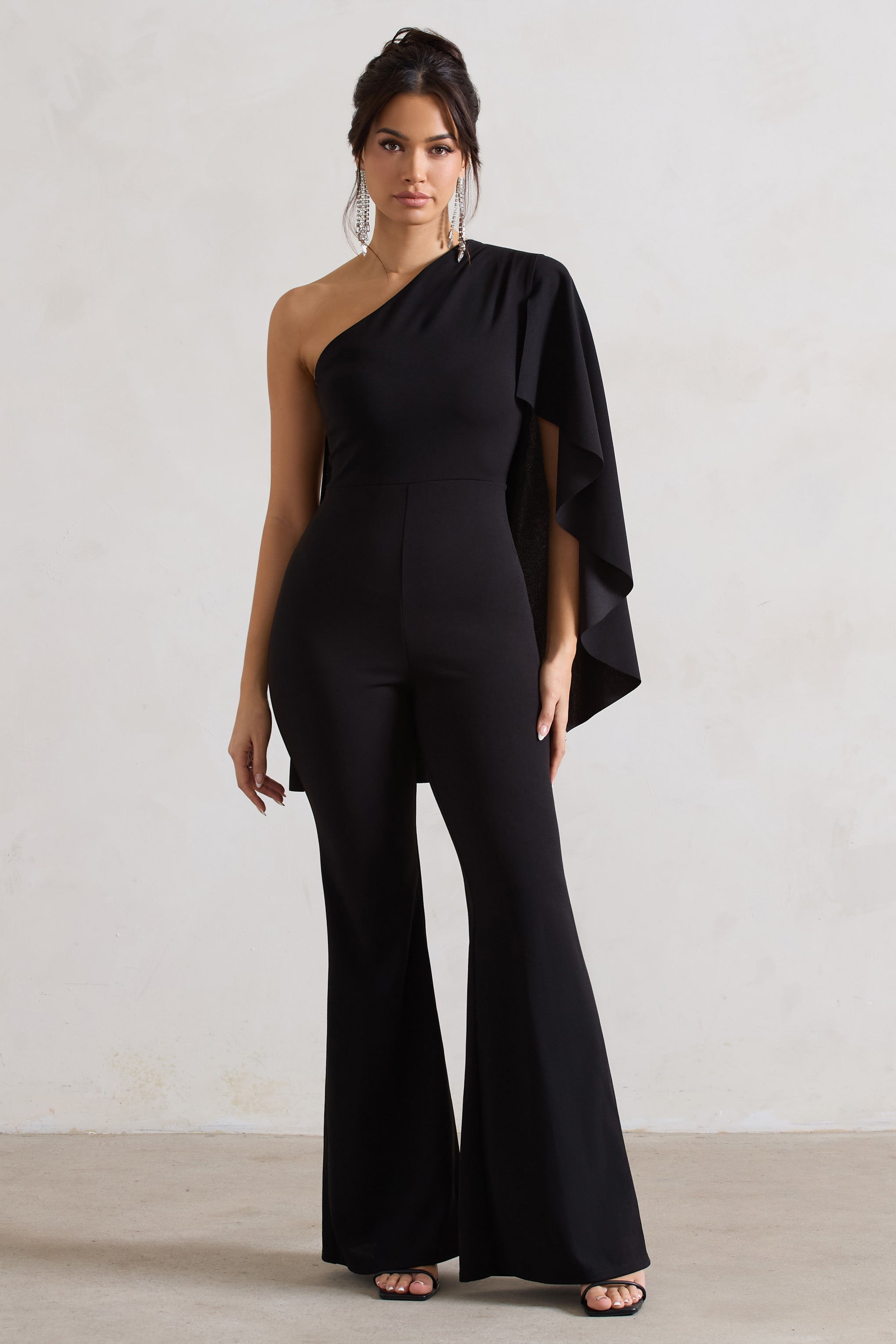 Pristine | Black Asymmetric Flared-Leg Jumpsuit With Cape Sleeve