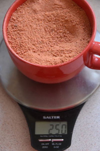 Ready Mix in a mug, on a set of scales.
