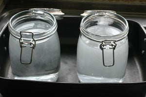 Two glass jars filled with water.
