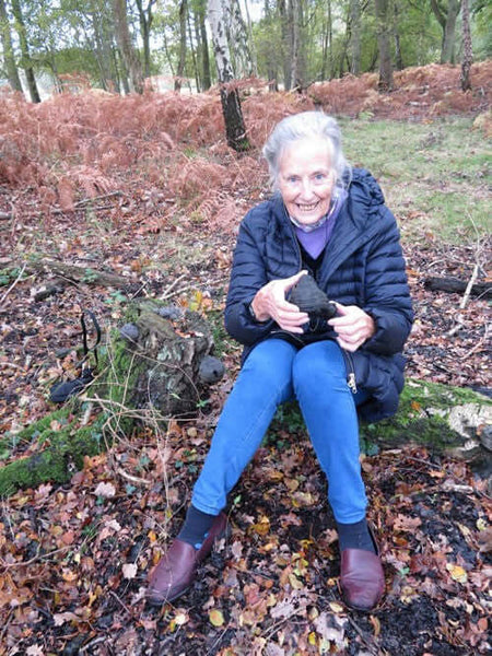 Margaret holding bracket fungus