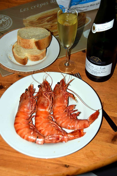 3 giant gambas, bread butter and white wine.