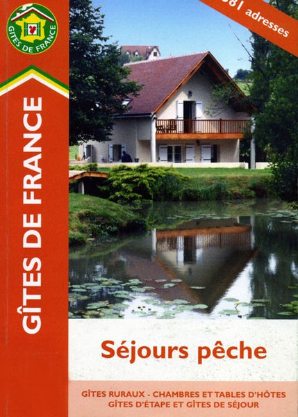 Front cover with French building, overlooking water.