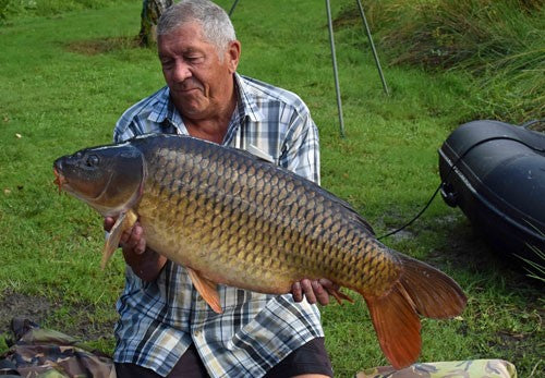 Ken holding a 15kg carp.