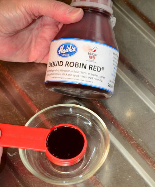 Measure-out-1-dessertspoonful-of-Liquid-Robin-Red