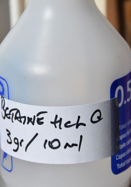 a handy spray bottle of home-blended liquid Betaine HCL