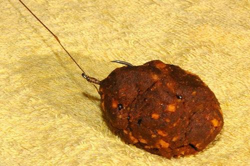 Image of a round paste bait on a hook