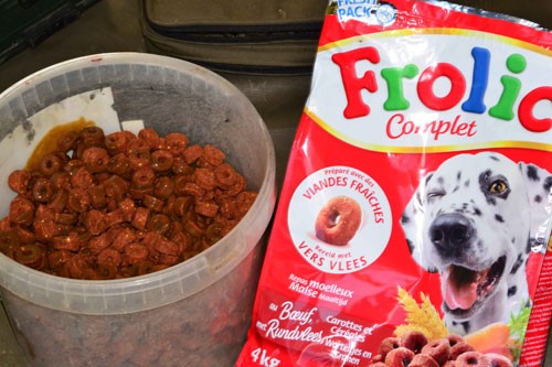 Image of a tub of soaking dog biscuits & a packet of Frolic complete dog food