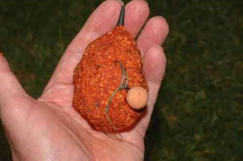 Fishing - Method feeder packed with the highly attractive Three-In-One mix SuperRed.