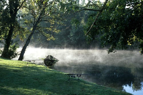 Image of a rod pod by a lake