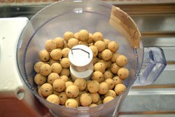Image of boiled round bait in a food processor