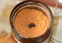 Image of dry fishing bait in a coffee grinder