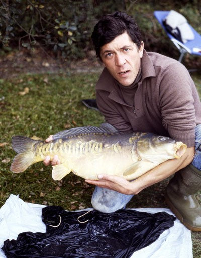 Image of Ken Townley holding a large carp