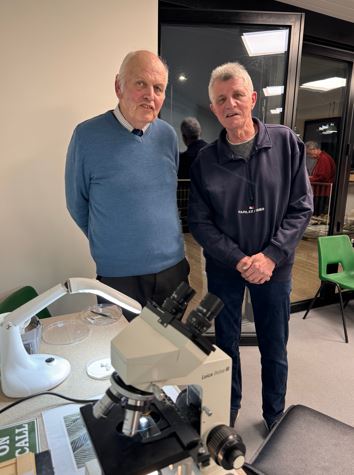 Photograph of Professor John Cooper and champion budgie breeder Chris Snell