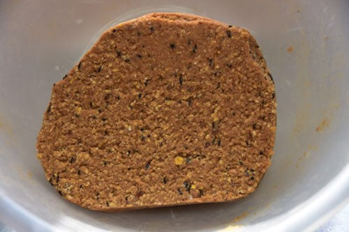 Orange-brown seeded fishing dough.