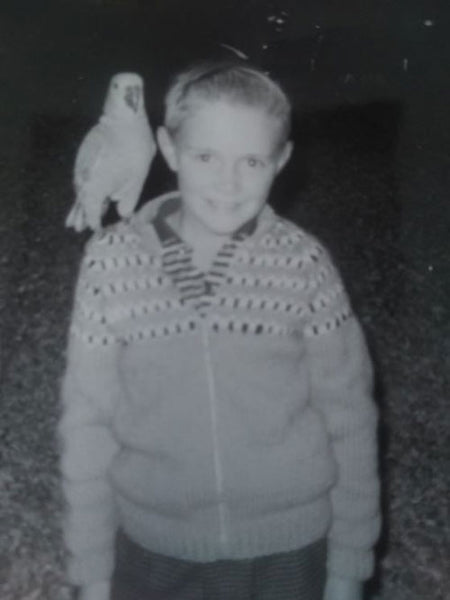 Young-David-stood-with-a-bird-on-hit-shoulder