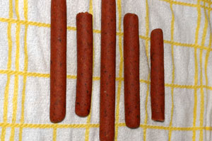 place-the-sausages-on-a-clean-kitchen-towel-to-cool