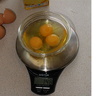 weighing eggs on the scales