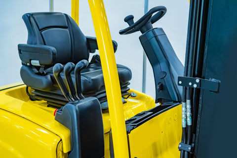 Driver's seat of forklift operator.