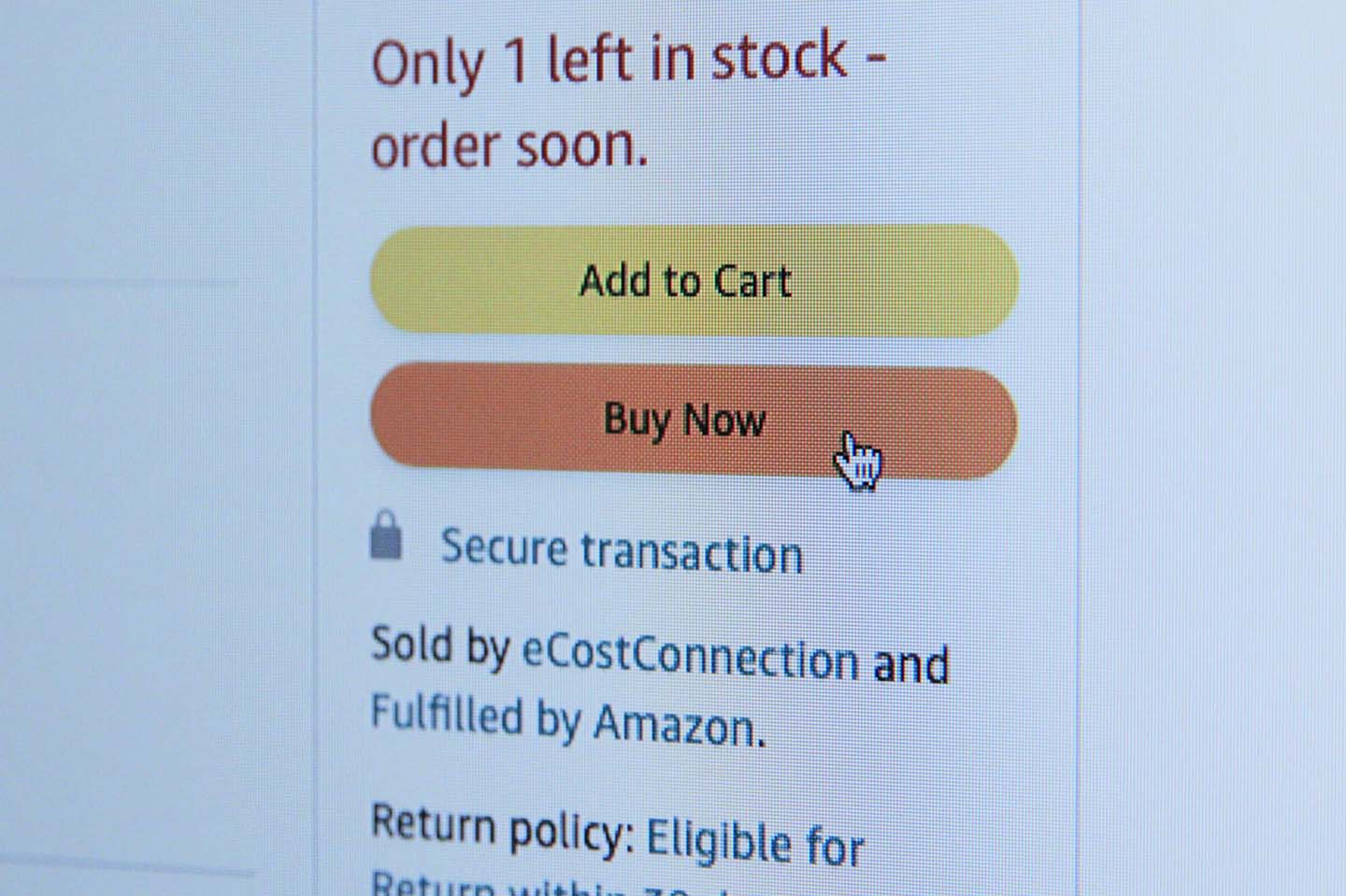 a screen pointer about to click the Buy Now button in an Amazon webpage