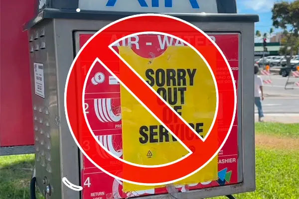 Air and water station with 'Out of Service' sign and prohibition symbol.