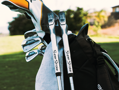 Traxion Tour Grips Leaning on a Golf Bag