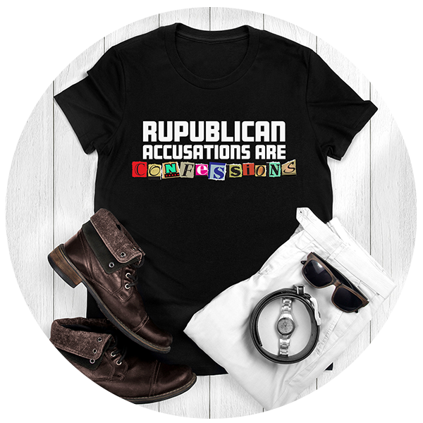 Black unisex t-shirt on a white wood background. The t-shirt reads “Republican accusations are confessions”. “Republican accusations” are a white, blocky font. “Confessions” is made from cut-out magazine letters to mimic a ransom note. There are a white pair of men’s pants, sunglasses, a belt, and men’s shoes arranged neatly in the photo.
