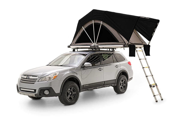 rooftop tent installed on a vehicle roof with ladder access