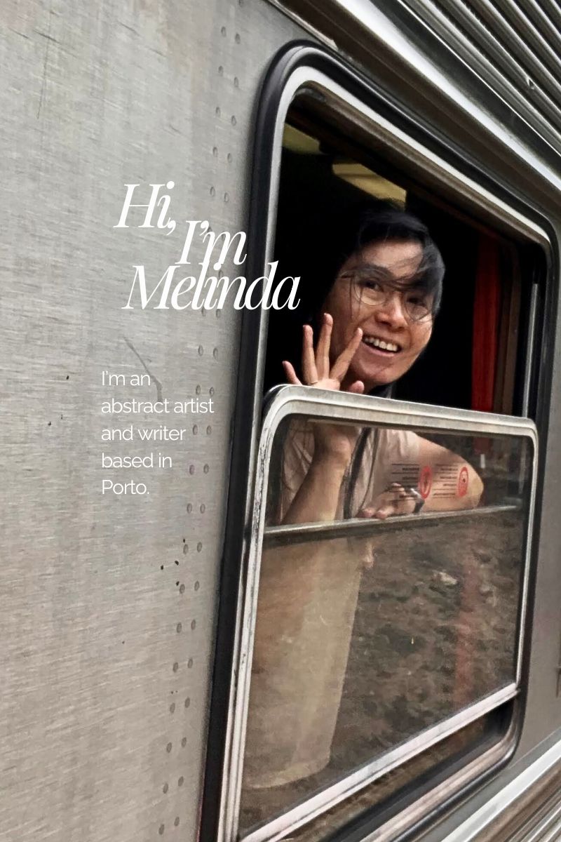 image: woman smiling and waving from a train window. Caption reads, Hi, I'm Melinda. An abstract artist and writer in Porto.