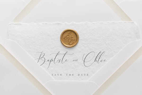 custom monogram wax seal on save the dates by kethstudio.com