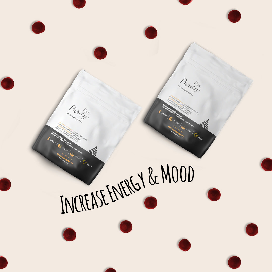 Two branded supplement pouches surrounded by red berries with text 'Increase Energy & Mood'.