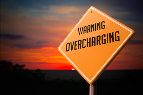 overcharging-on-warning-road-sign